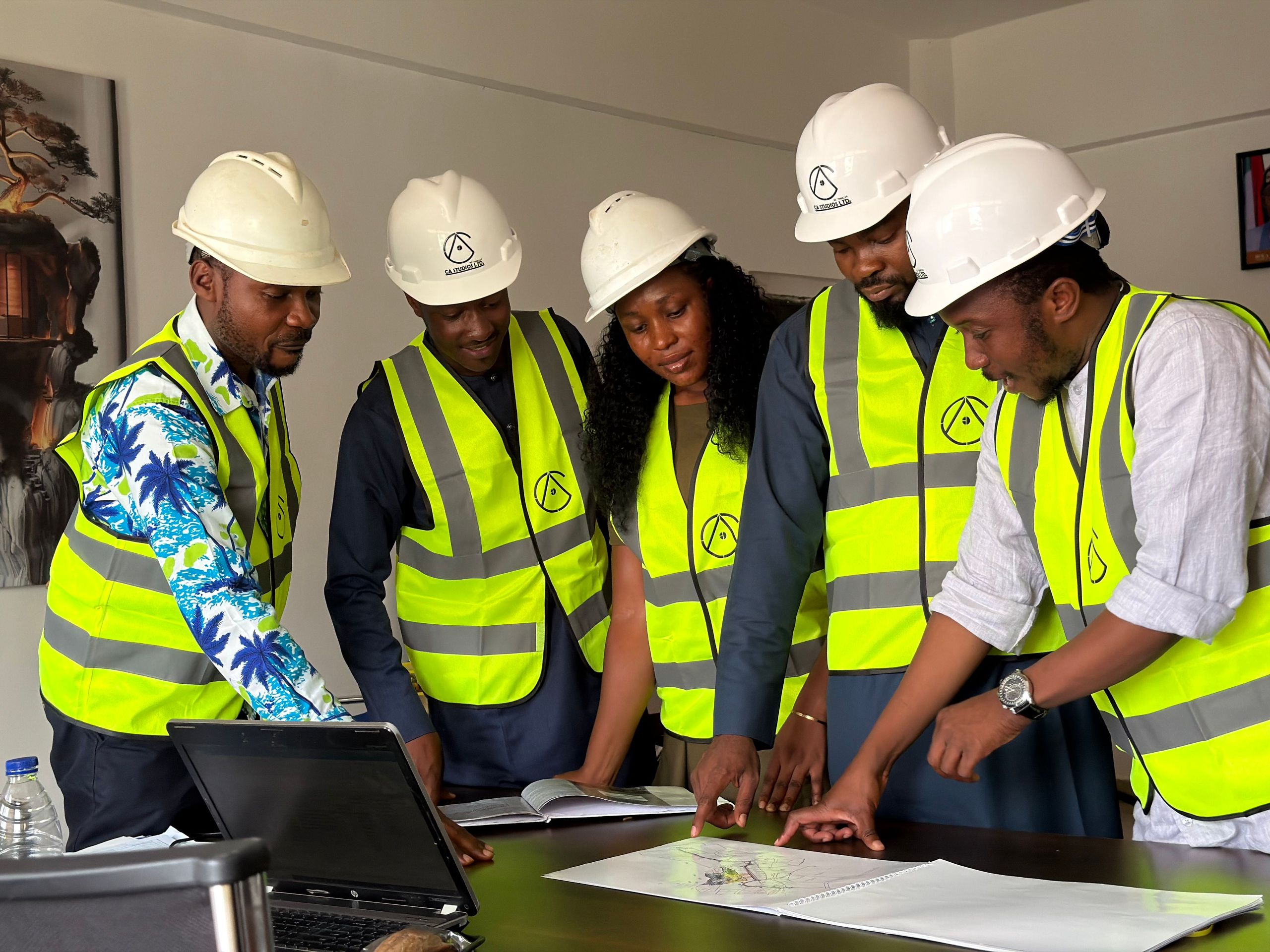 Engineers reviewing blueprints